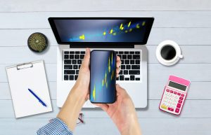 business people are using stock chart innovative technology mixed media digital smartphone and online shopping concept